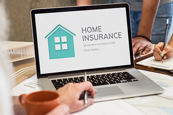home insurance website in a laptop